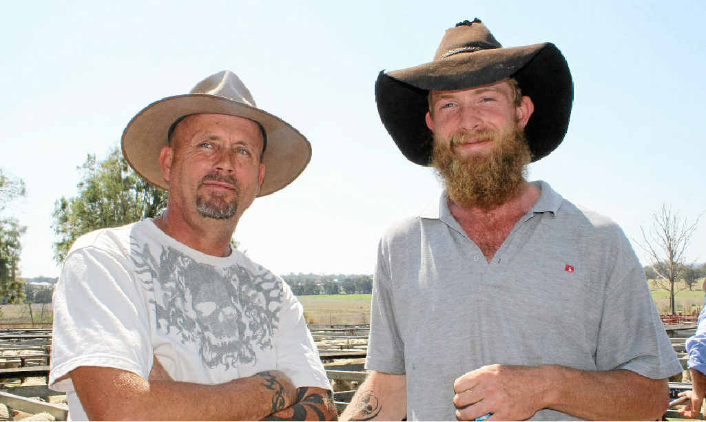 New Karara resident Brad Gough (left) and Pilton man Scott McInnes sheep sale. New Karara resident Brad Gough (left) and Pilton man Scott McInnes sheep sale.